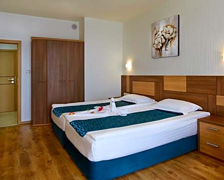 Two-Bedroom Suite with Balcony and Sea View