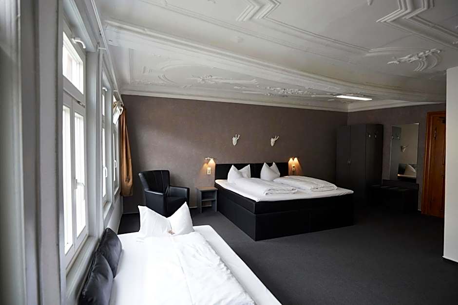 Photo 1 of 10 of Triple Room with Bathroom