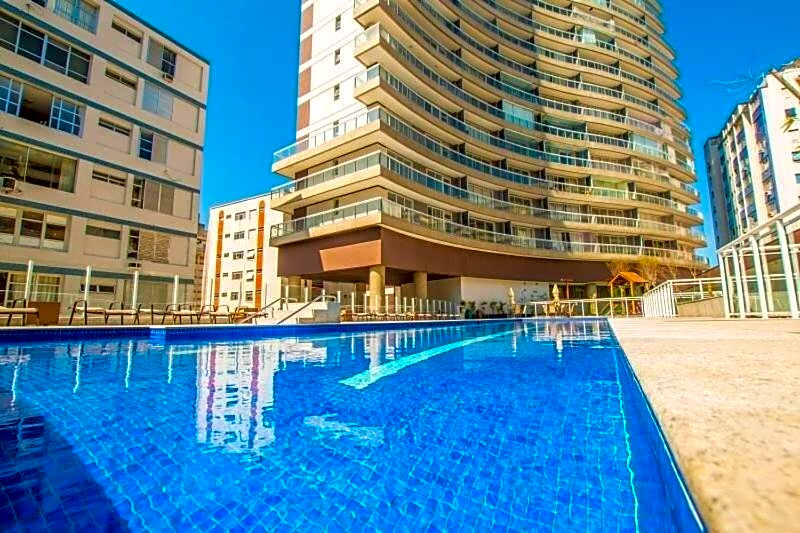 Studio moderno em condomínio de luxo pé na areia