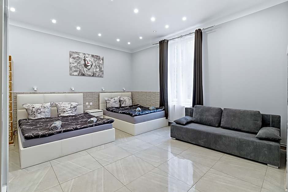 Queen Apartments