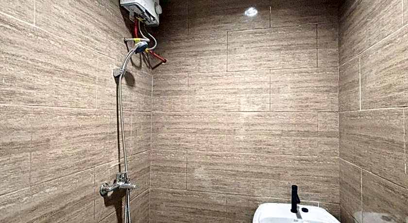 Tini's Guest House Malang Mitra RedDoorz