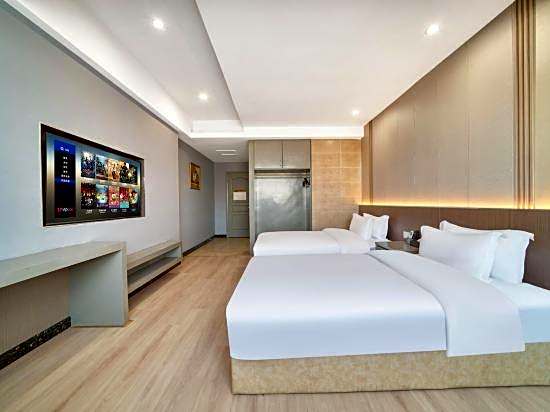 Nanyuan e Home Hotel (Cixi Palm Qi Branch)