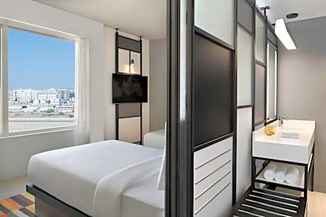 2 Bedroom Family Suite, Bedroom 1: 1 King, and 2 Twin, Bedroom 2:, City view