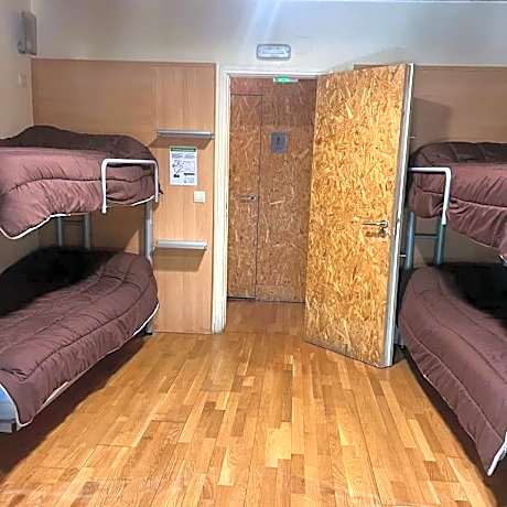 Single Bed in Dormitory Room
