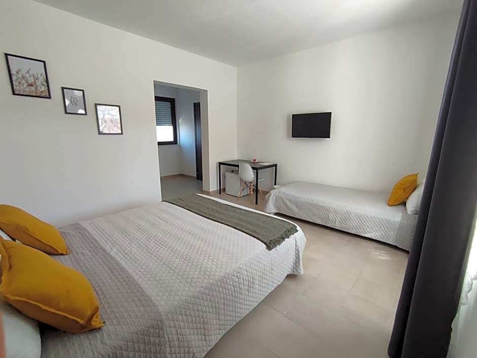 Photo 1 of 8 of Triple Room with Private Bathroom