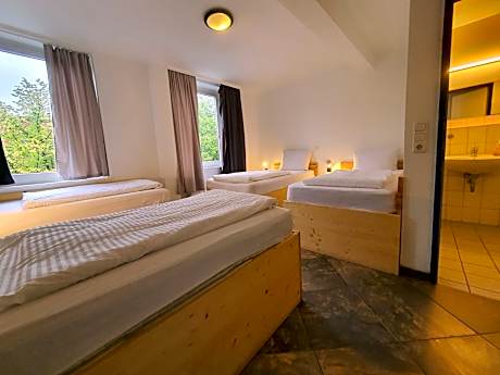 Quadruple Room with Private Bathroom