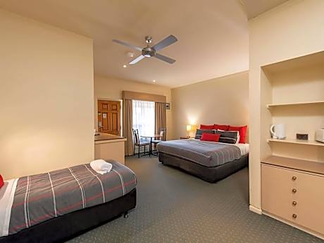 Standard Suite with One King Bed and Two Single Beds