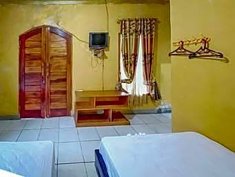 Penginapan Diar near Pantai Santolo Mitra RedDoorz