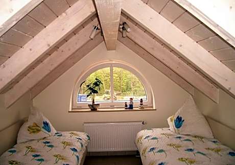 Ferienwohnung mit 1 Schlafzimmer und Schlafsofa für bis zu 3 Personen - Landseite
