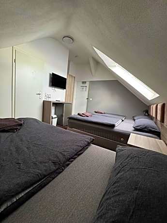 Quadruple Room with Private Bathroom