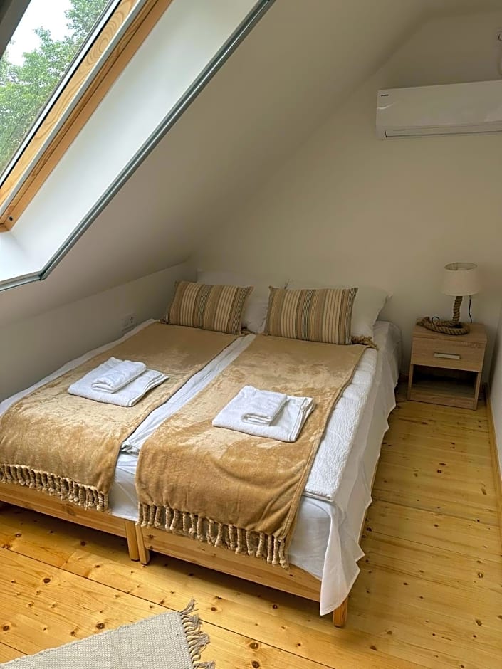 Öböl Liget vendégházak