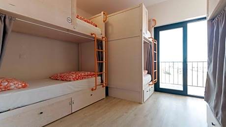 Bed in 6-Bed Female Dormitory Room