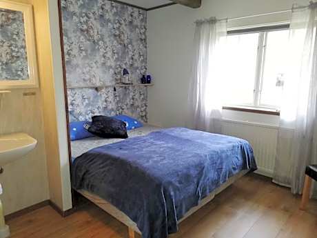 Quadruple Room with Shared Bathroom