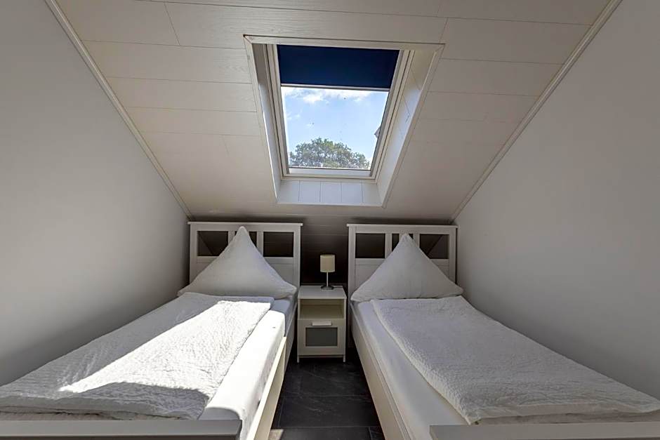Natura Ferienhaus, Ferienwohnungen in Rhauderfehn , Komfort für Gäste & Firmen ,WLAN & Parkplatz