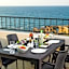 Olivia Palm Hotel