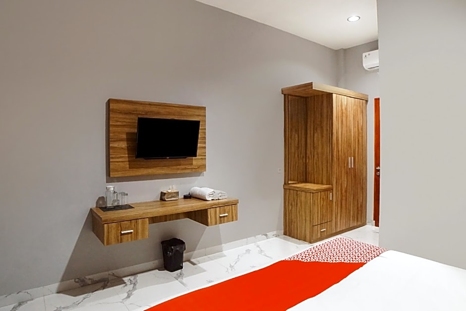 SUPER OYO Capital O 92066 Papakoel Hotel & Cafe