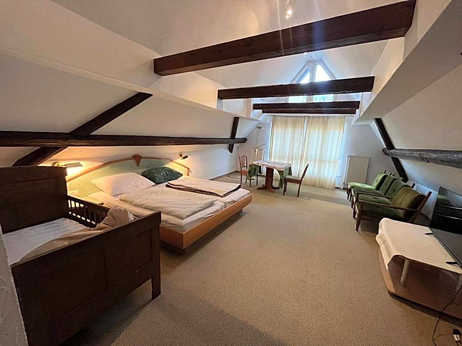 Photo 1 of 5 of Triple Room with Shared Bathroom