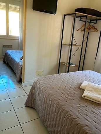 Quadruple Room (2 Adults + 2 Children)