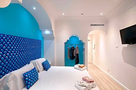 Superior Quadruple Room with Balcony and Partial Sea View