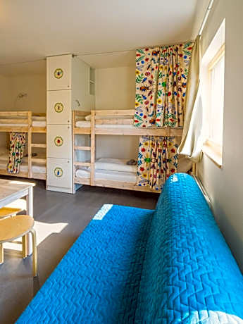 Single Bed in Dormitory Room