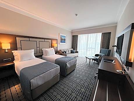 Twin Room with Two Twin Beds and Sofa Bed - City View