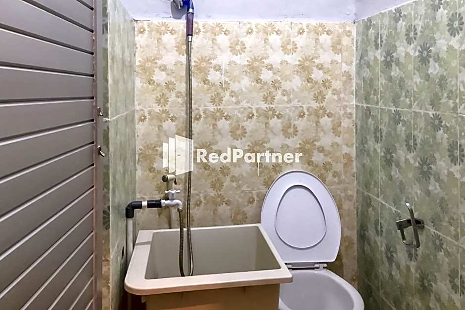 Aquino Marito Homestay Mitra RedDoorz