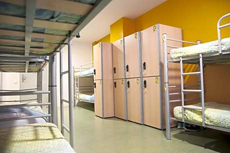 One Bed in a 12-Bed Shared Dormitory