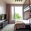 Hugo Apartment Hotel