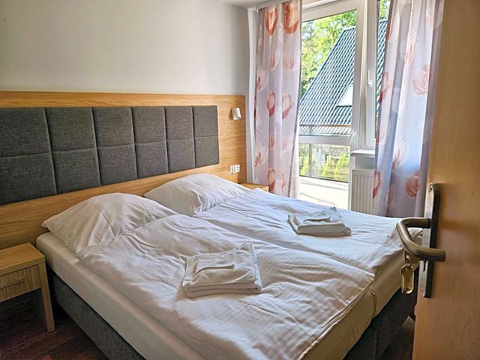 Angela Domki i Pokoje