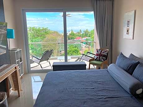 One-Bedroom Apartment with Balcony and Sea View