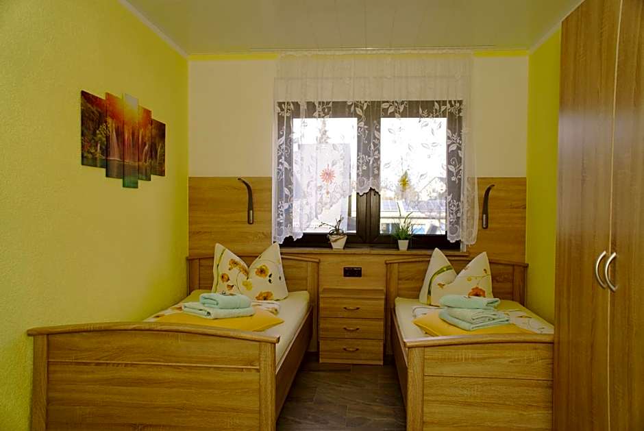 Photo 1 of 5 of Standard Twin Room with Shared Bathroom