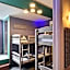 Attic Capsule Hotel