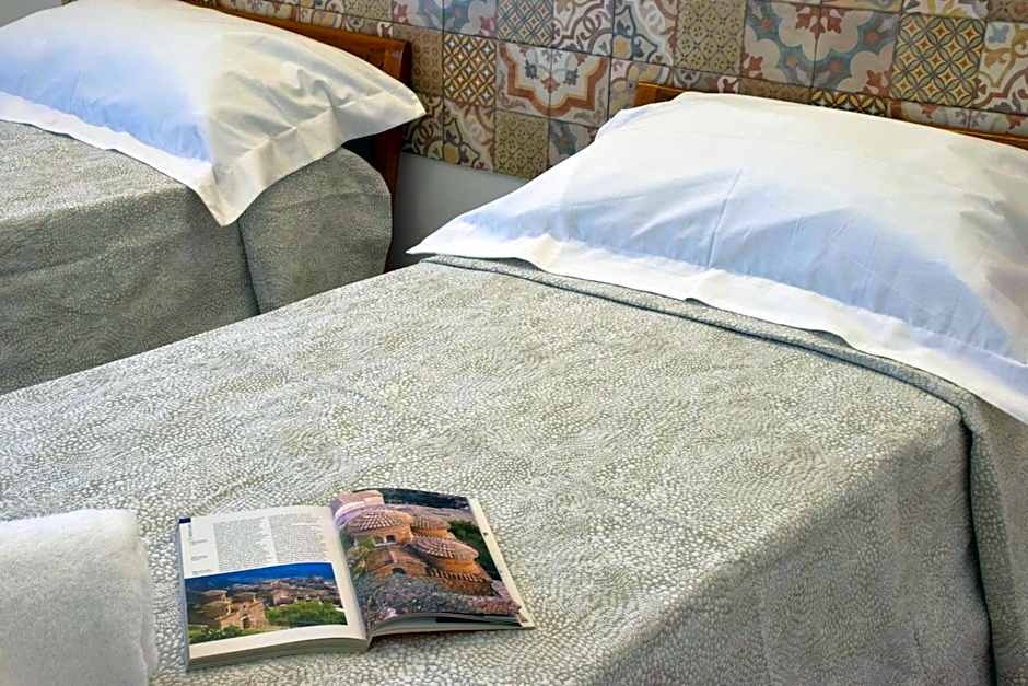 Accòmodati - Camere e Appartamenti