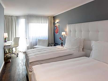 Standard double room with two single beds