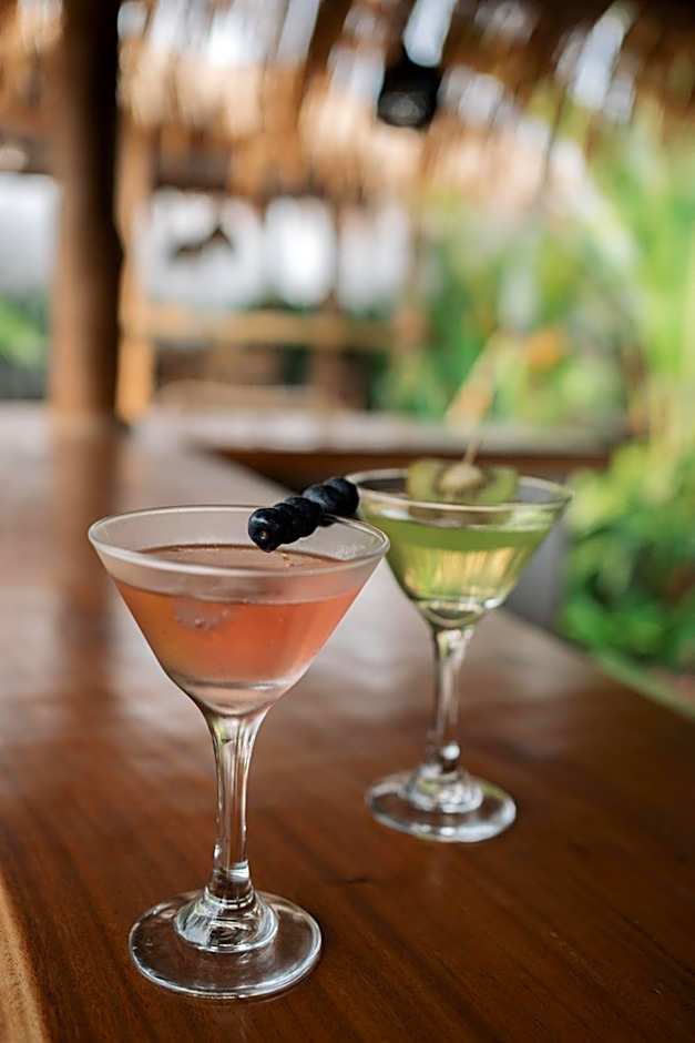 EHOA NYANYI BEACH Boutique Hotel - In front of entrance to NUANU