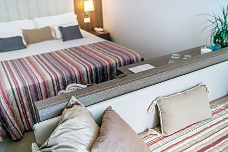 Superior Triple Room with Balcony and Partial Sea View