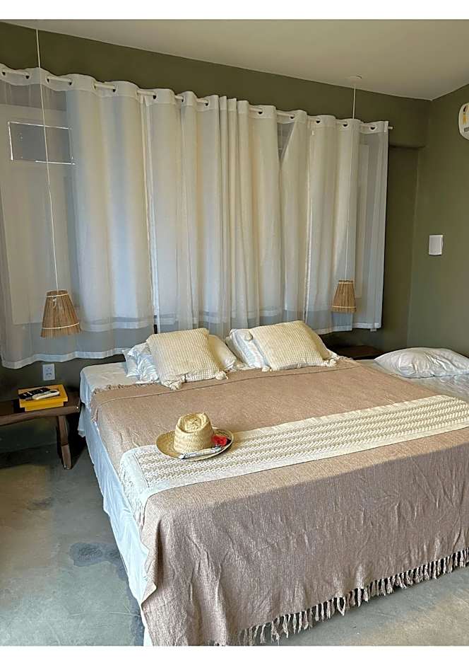 Casa Ilha| beira mar, piscina aquecida, 4 suítes