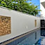 One World One Home Naiharn Hotel
