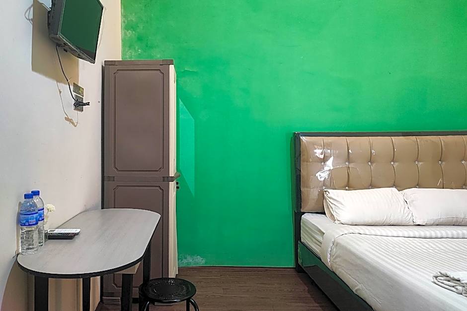 RedDoorz Syariah near Universitas Jambi Telanaipura