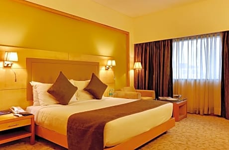 Executive Suite with complimentary breakfast, 10% Discount on F&B ,High Tea at French Crust(1600-1700) hrs,Evening Cocktail hours(1800-2000)hours at Atrium Bar, One way Airport Transfer