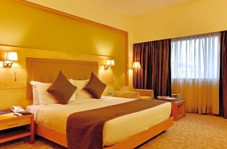 Executive Suite with complimentary breakfast, 15% Discount on F&B ,3 pints of beer at Atrium Bar, One way Airport Transfer