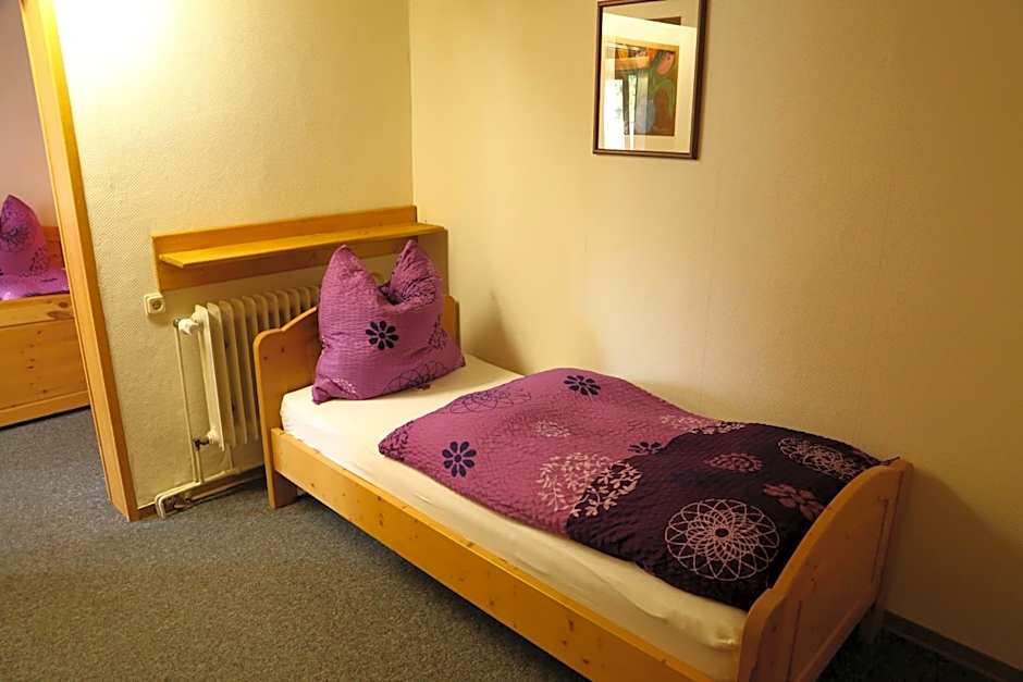 Photo 1 of 5 of Triple Room with Bathroom