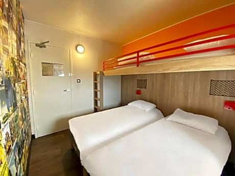 Break Room with Three Single Bunk Beds and Shared Bathroom