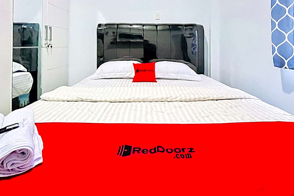 RedDoorz @ MG House Siantar Timur
