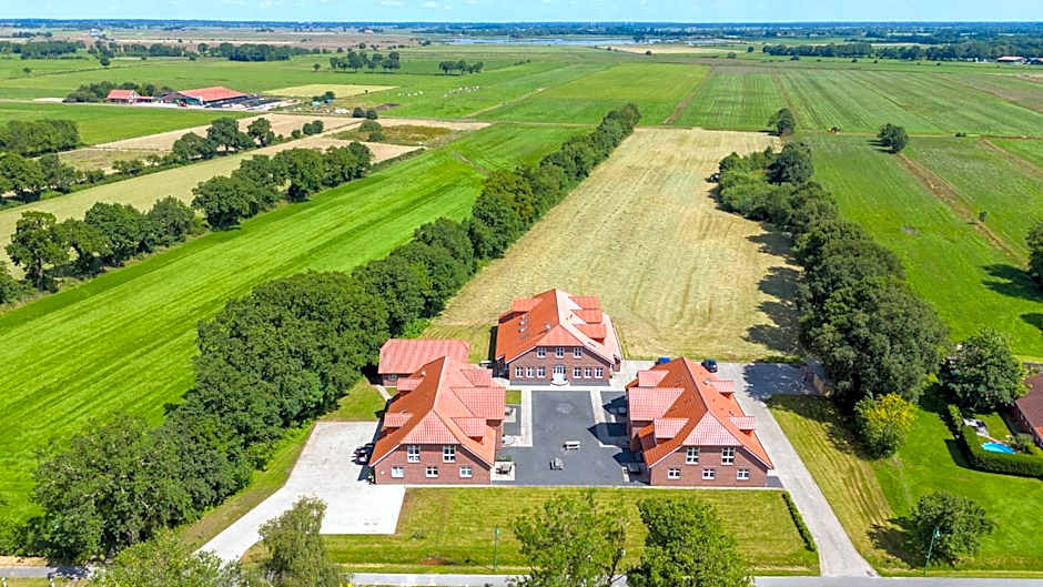 Natura Ferienhaus, Ferienwohnungen in Rhauderfehn , Komfort für Gäste & Firmen ,WLAN & Parkplatz