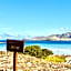 Villas with air conditioning and shared pool, just a few minutes from La Pelosa beach