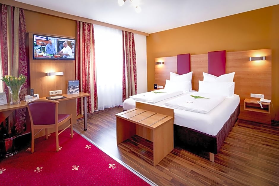 Tiptop Hotel Burgschmiet Garni