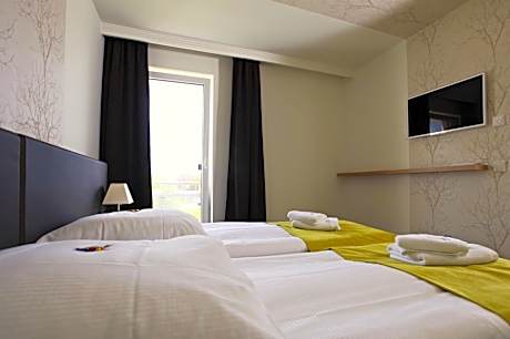 One-Bedroom Apartment (2 Adults + 2 Children)