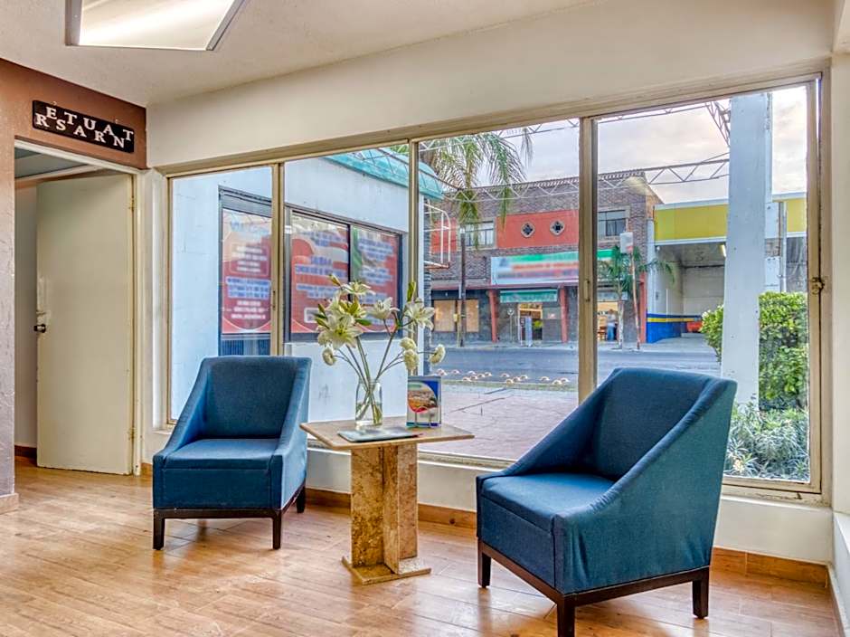 Capital O Hotel La Siesta