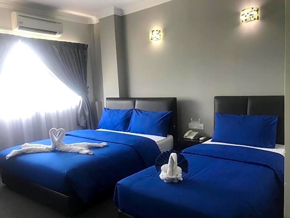 Photo 1 of 6 of Deluxe Triple Room